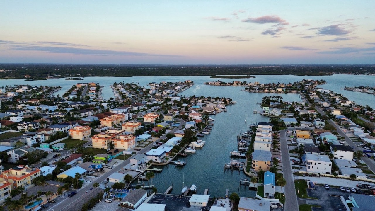 Waterfront neighborhood with canals at dusk